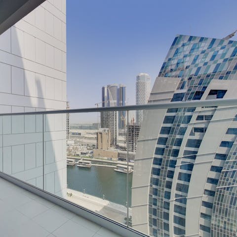 Admire the Dubai Canal vistas from the balcony