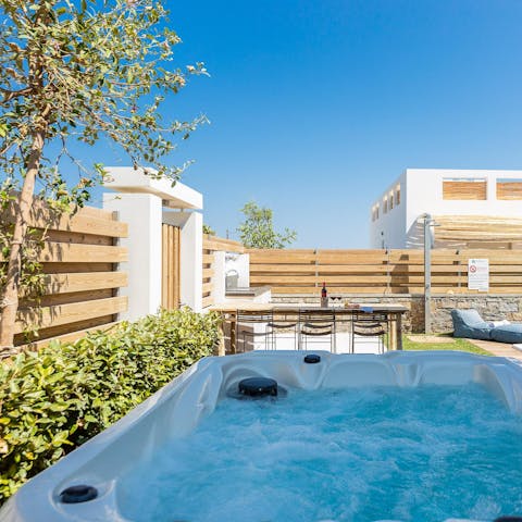 Unwind in the relaxing bubbles of the hot tub