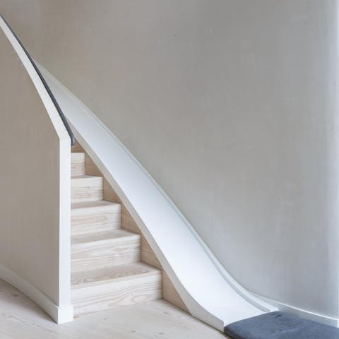 Forget the stairs, take the slide down from one floor to the other