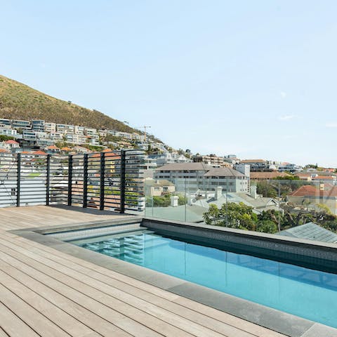 Swim in the communal pool to beat the Cape Town heat