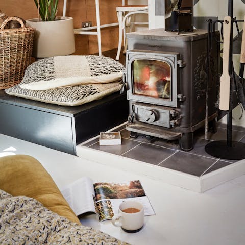 Cosy up in front of the fire with a hot cup of tea
