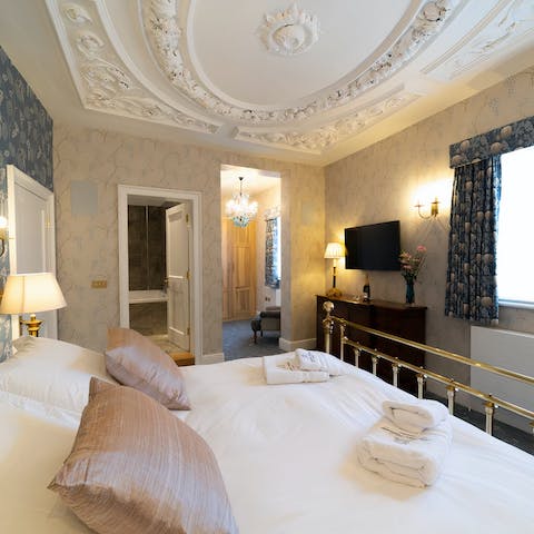 Sleep under a Grade II-listed ornate ceiling in the main bedroom