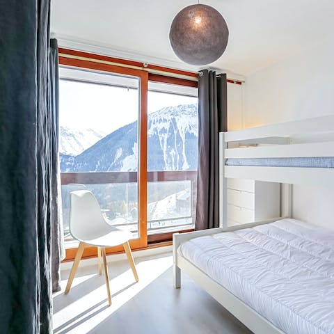 Admire the spectacular views of the Alps from your bedroom window