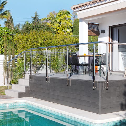 Step outside and enjoy the height of relaxation from the terrace and pool 