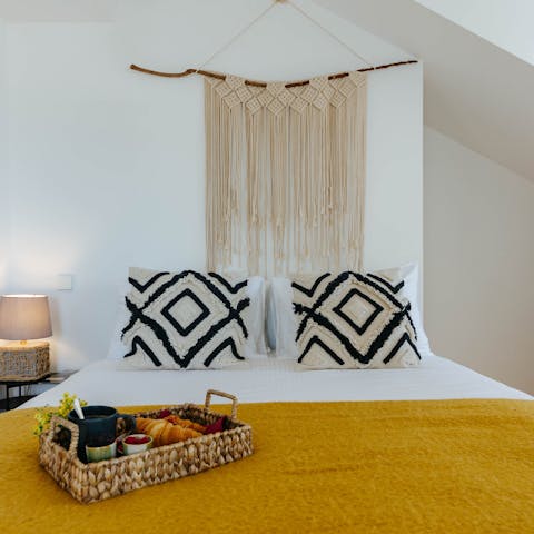 Enjoy a restful night's sleep in the boho-chic bed space