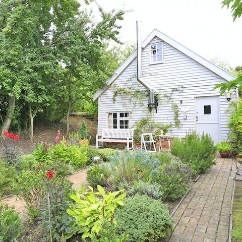 Eat, drink and relax on summer evenings in the stunning cottage garden