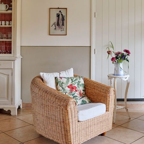 Curl up in the rattan armchair with a good book