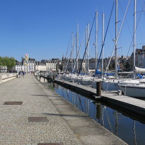 Watch the boats bob on the water at Port de Vannes, a fifteen-minute drive away