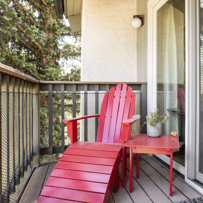Relax and unwind on the deck chair with a book