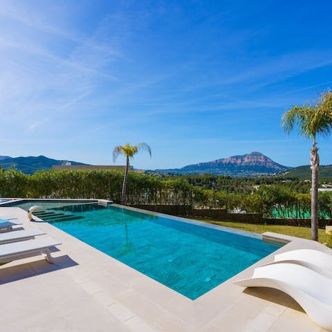 Find total relaxation while lounging by the private pool