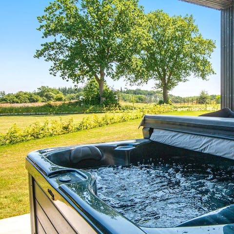 Immerse yourself in the natural elements from the hot tub