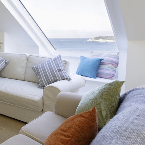 Get a glimpse of the ocean from the living area's Velux windows