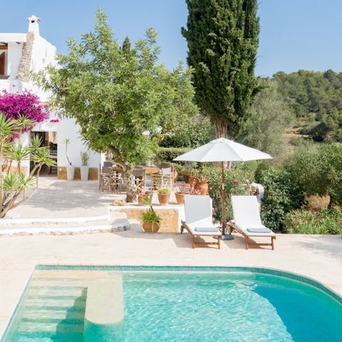 Enjoy a sun-kissed dip in the heated swimming pool