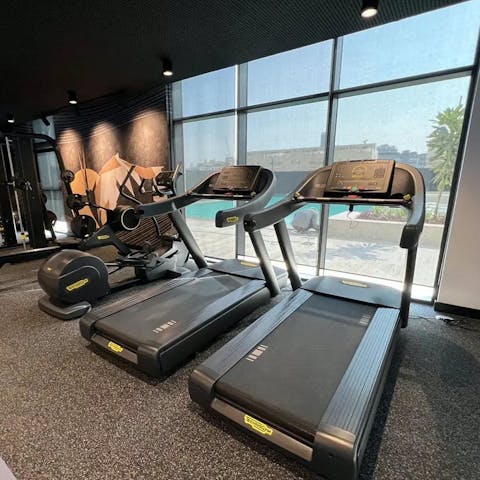 Keep on top of your fitness routine at the on-site gym 