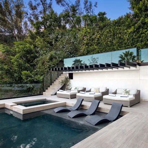 Chill out on the day beds, take a dip in the pool, or enjoy the best of both worlds on the ledge loungers
