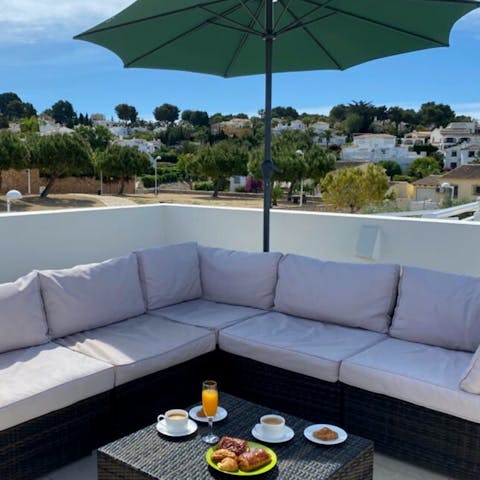 Lounge at the outdoor seating area in the summer sunshine