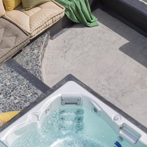 Slip into the Jacuzzi on your private terrace to end the day the right way