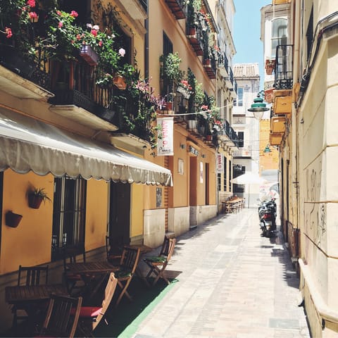 Stroll around Málaga's charming historic centre, approximately a fifteen-minute drive from your apartment
