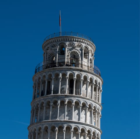 Visit Pisa and its famous Leaning Tower, just over a forty-minute drive from your home