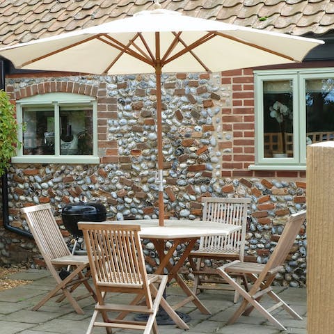 Enjoy your morning coffee or a bite to eat on the outdoor table