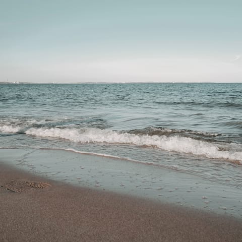 Soak up the sun at Pori Beach, three minutes away by car