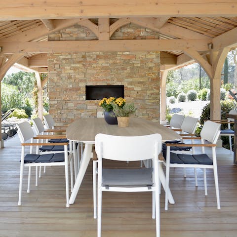 Dine alfresco Mediteranean style under the covered outdoor living area 