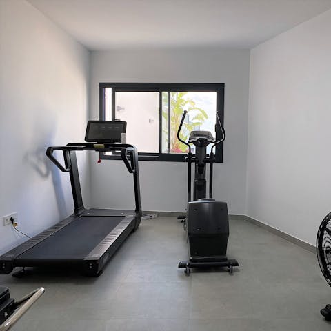 Stay on top of your fitness routine with a workout in the on-site gym 