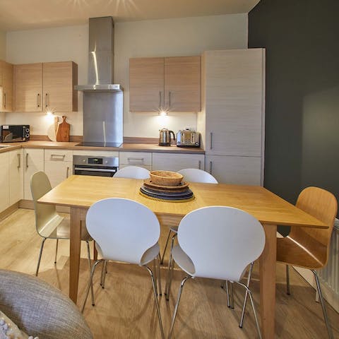 Gather for a group meal in the sleek dine-in kitchen