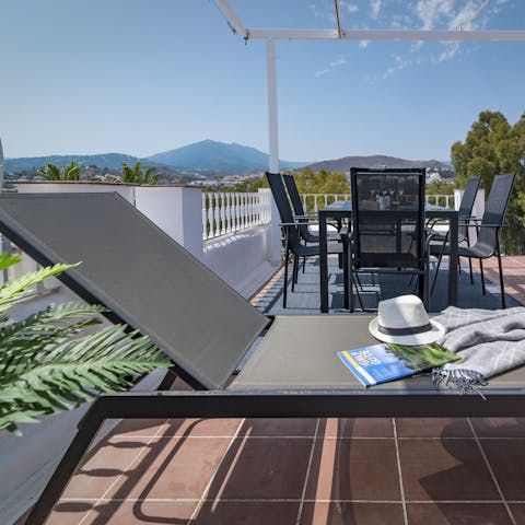 Sunbathe with a good book while you enjoy the views from one of the terrace loungers