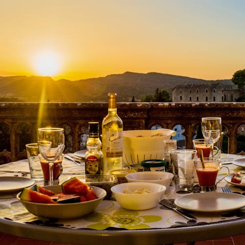 Sip a glass of Sangria at sunset on the serene terrace 