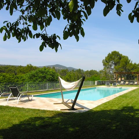 Relax by the swimming pool in the Spanish sunsine