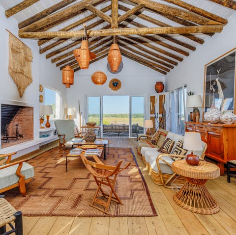 Reconnect with your loved ones by the cosy fireplace, chatting beneath exposed beams