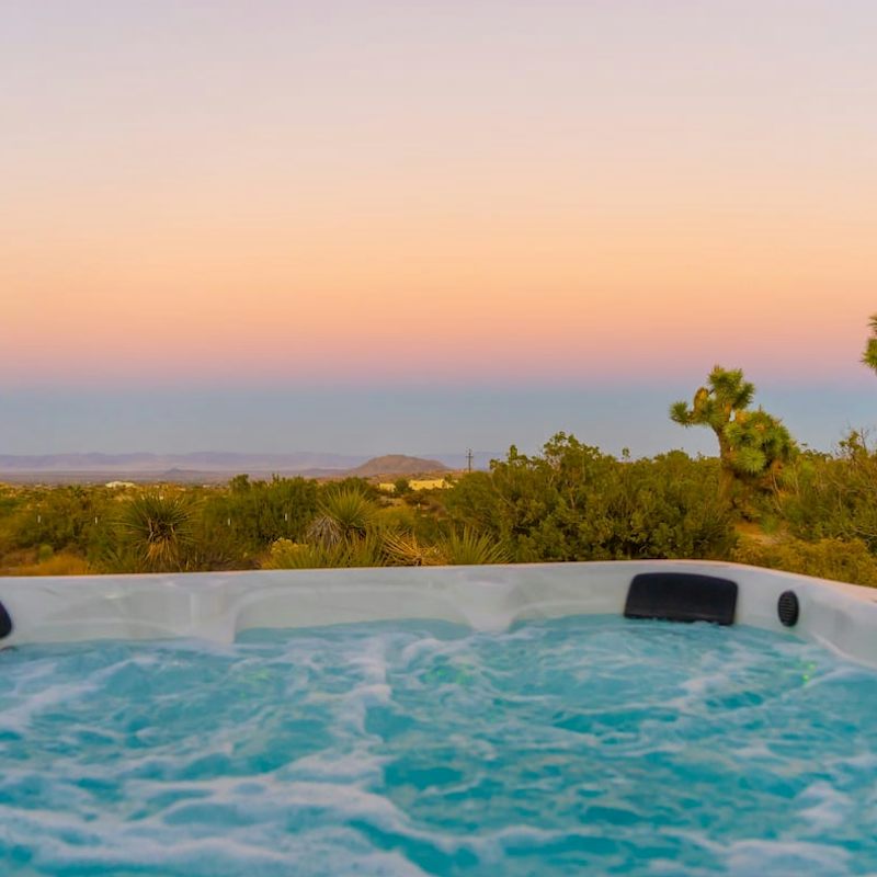 Watch the sunset from the bubbles of your hot tub