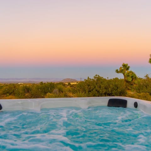 Watch the sunset from the bubbles of your hot tub