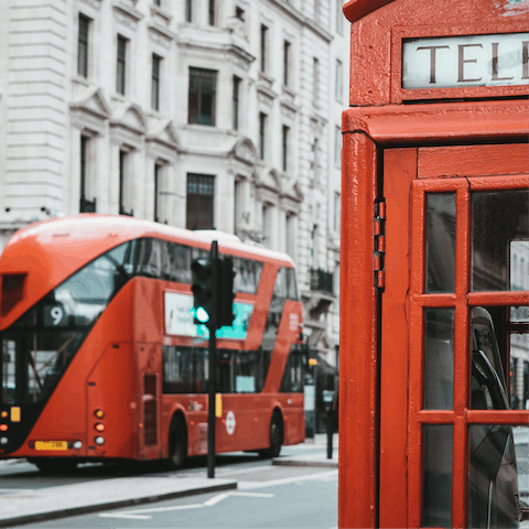 Hop on an iconic red bus to go shopping on Regent Street