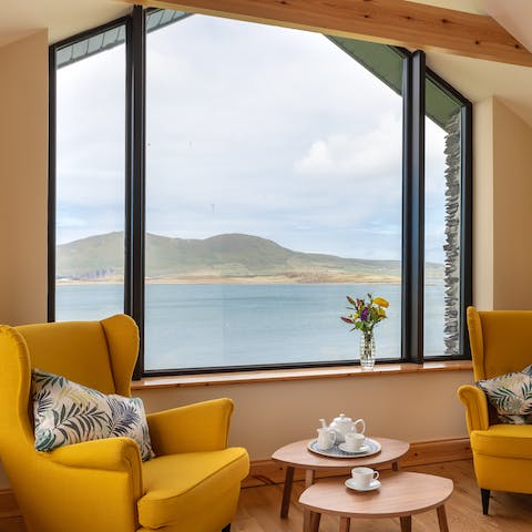 Sneak away to the main bedroom sitting area to drink up those views with a cuppa