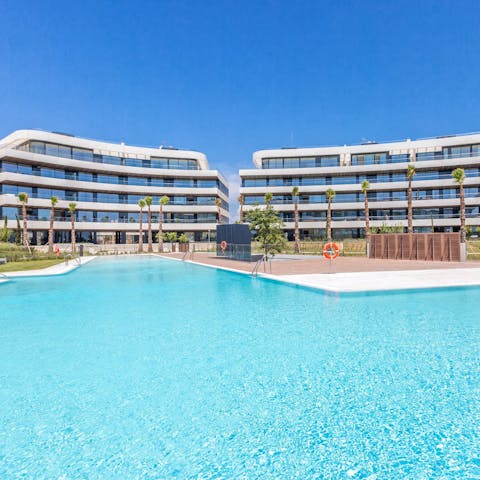 Cool down from the sun in the communal swimming pool