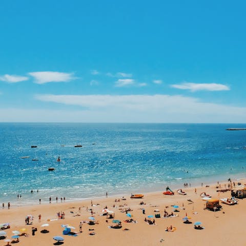 Stretch your legs with a stroll down to Castelo Beach