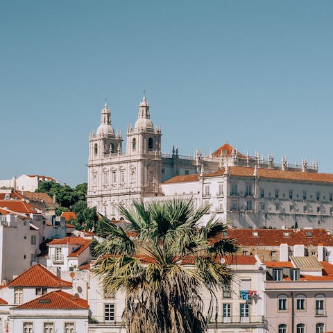 Explore Lisbon's historic Alfama district, a twenty-minute walk away