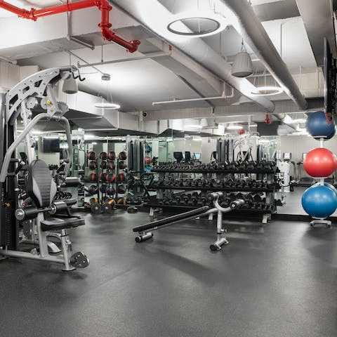 Work on your fitness goals in the building's gym