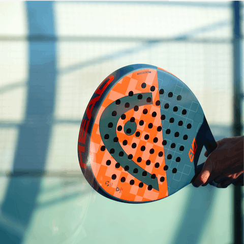 Try your hand at Padel on the building's shared court