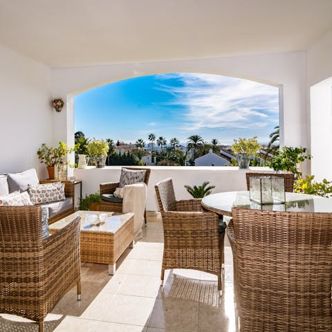 Relax on the private terrace and gaze out at the Mediterranean Sea in the distance