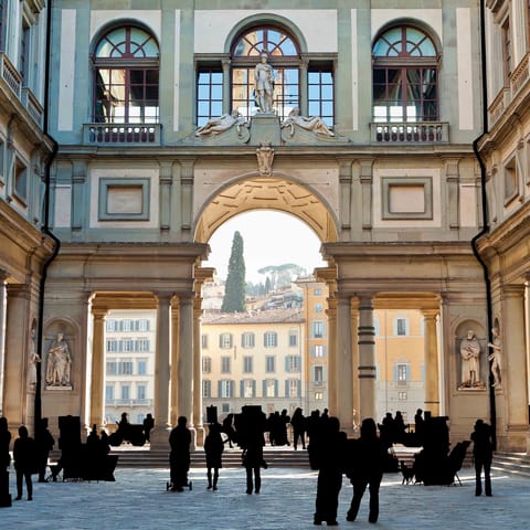 Stroll ten minutes down the banks of the Arno to reach the Uffizi Gallery