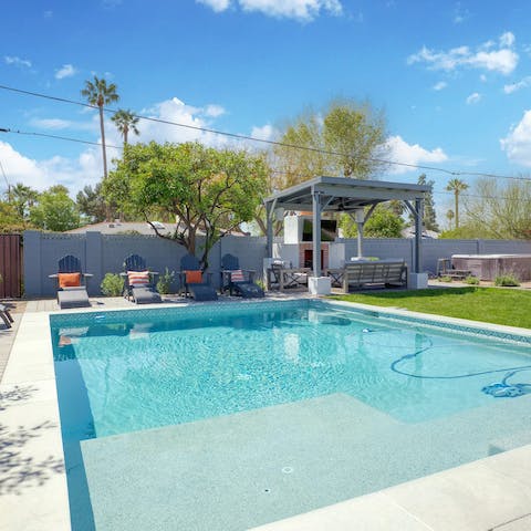 Cool off from the desert heat with a dip in the private pool