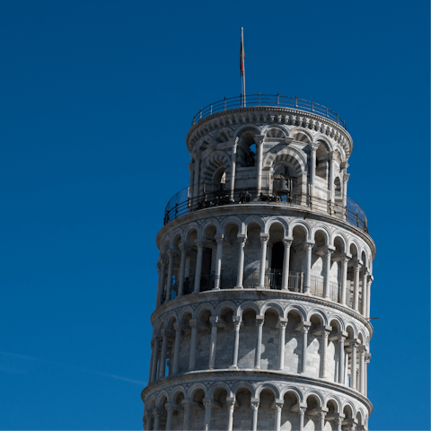 Peer out over the balcony at the Leaning Tower of Pisa and drive over to the landmark in seventeen minutes
