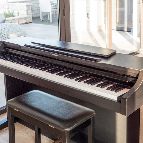 Make your own evening entertainment on the piano indoors after dinner