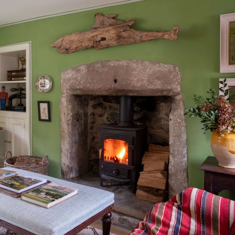 Warm up by the wood burner after a day in the great outdoors