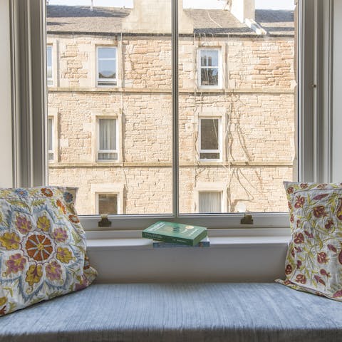 Curl up with a book and a view of the city's sandstone buildings