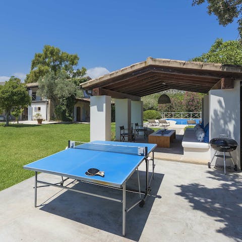 Fire up some friendly competition with a spot of table tennis, or get the barbecue going in this sociable outdoor area