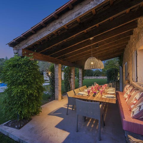 Spend a magical evening together, sharing a meal, some wine, and lively conversation on this inviting terrace